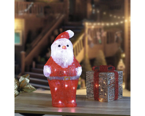 Verlichte kerstman en cadeau als kerstdecoratie