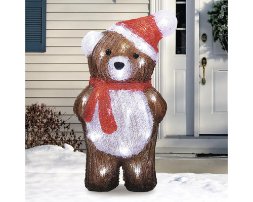 Verlichte teddybeer met kerstmuts en sjaal als kerstdecoratie voor buiten