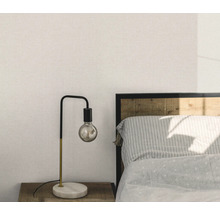 Slaapkamer met nachtkastlamp met zichtbare gloeilamp