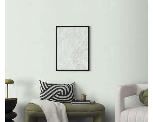 Woonkamerdecoratie met ingelijste afbeelding van bladerenpatroon