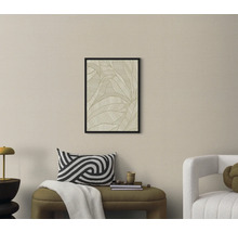 Woonkamer met een ingelijste foto van een bladpatroon