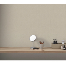 Decoratief behang in de slaapkamer boven een kaptafel