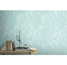 Close-up van een muur met behang met bladmotief