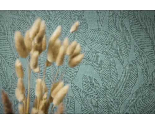 Close-up van een groen behang met bladmotief