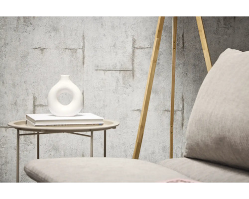 Decoratief behang met betonlook en wapeningsstaaldesign in de woonkamer.