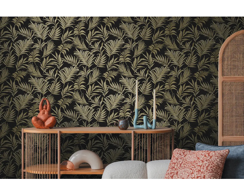 Decoratief kamerzicht met een wandbehang met bladmotief