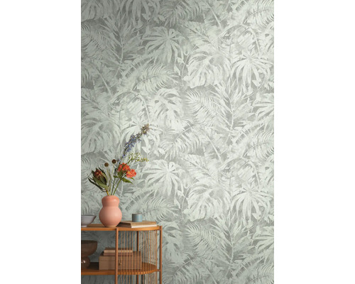 Behang met tropisch plantenpatroon op de muur