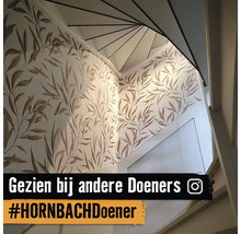 Trappenhuis met bloemmotief behang