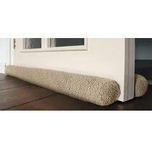 Tochtstrip voor een deur op de vloer