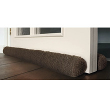 Tochtstopper voor een deur op een houten vloer