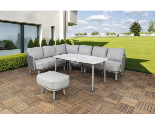 Tuinmeubelset met hoekbank, tafel en kruk op houten terras