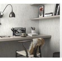 Werkkamer met bureau, stoel, lamp en typemachine