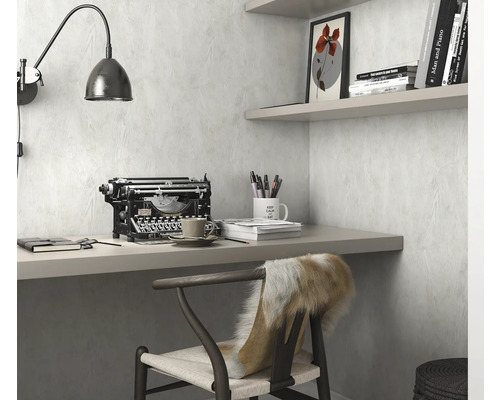 Werkkamer met bureau, stoel, lamp en typemachine