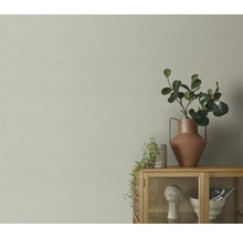 Close-up van een muur met textielbehang in canvaslook