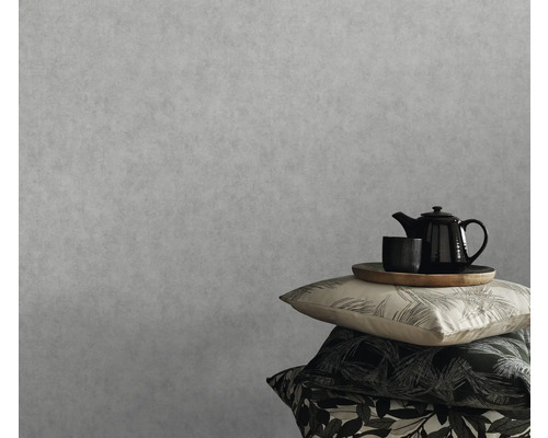 Grijs vliesbehang met theepot en kussens