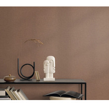 Close-up van een gestructureerd wandbehang in een interieur