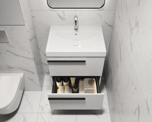 Moderne badkamer met wastafelonderkast, open lade en kraan