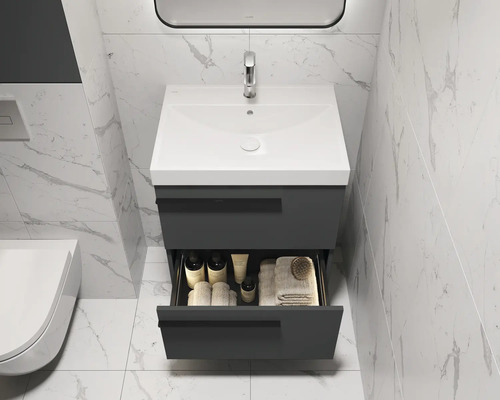 Moderne badkamer met wastafelonderkast en open lade voor opslag