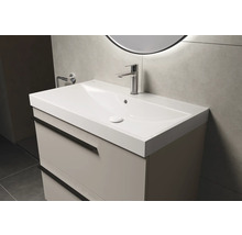 Wastafelonderkast met wastafel en kraan in de badkamer