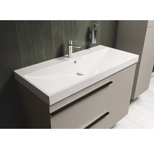 Wastafelmeubel met wastafel, kraan en ladeonderkast voor de badkamer.