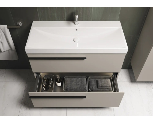 Wastafelonderkast met open lade in badkamer