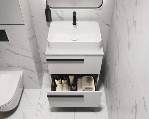 Moderne badkamer met witte wastafelonderkast en open lade