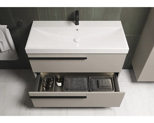 Wastafelonderkast met open lade in de badkamer