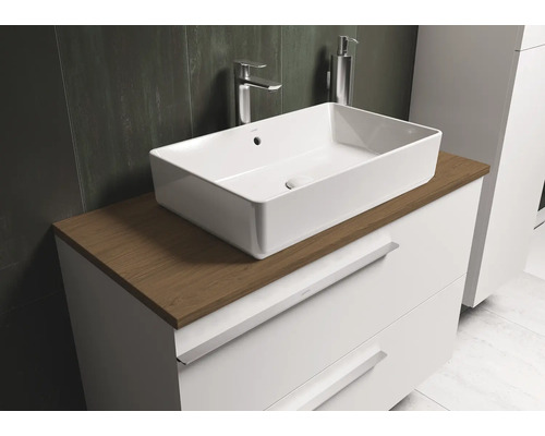 Rechthoekige opzetwastafel op een badkamerkast met lades