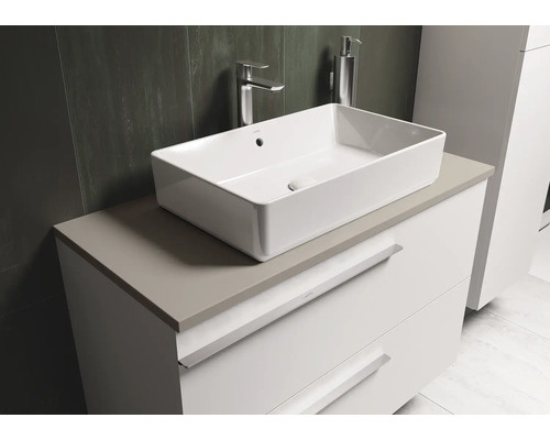 Badkamer met wastafel op een onderkast