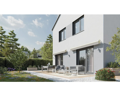 Modern huis met terras en tuinmeubelen