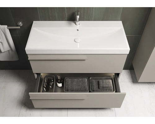 Wastafelonderkast met open lade in de badkamer