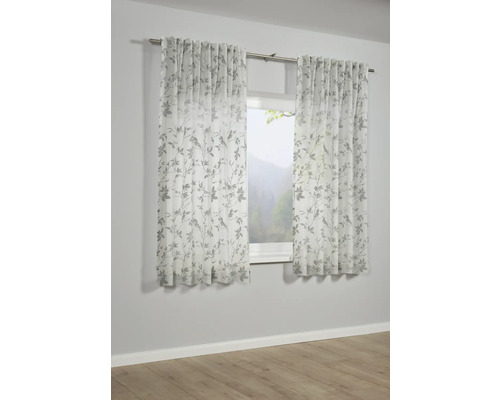 Raam met transparante gordijnen met bladmotief