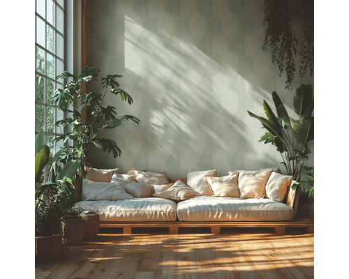 Lichte kamer met palletbank, kussens en kamerplanten
