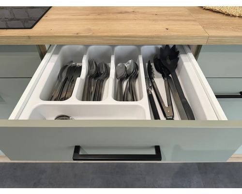 Open lade met bestek en bestekbak