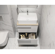 Badkamerwastafel met open lade, wastafel en kraan