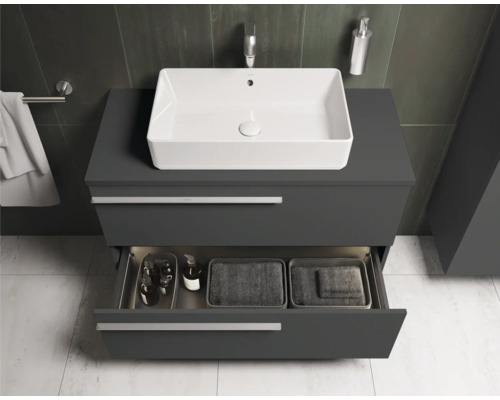 Badkamer wastafelonderkast met open lade en opzetwastafel