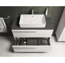 Wastafelonderkast met open lade en rechthoekige opzetwastafel