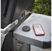 Smart Probe temperatuursensor met smartphone op een grilltafel