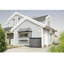 Tuinberging voor een huis met gevelbekleding