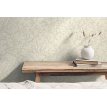 Close-up van een wandbehang met een subtiel bladerpatroon