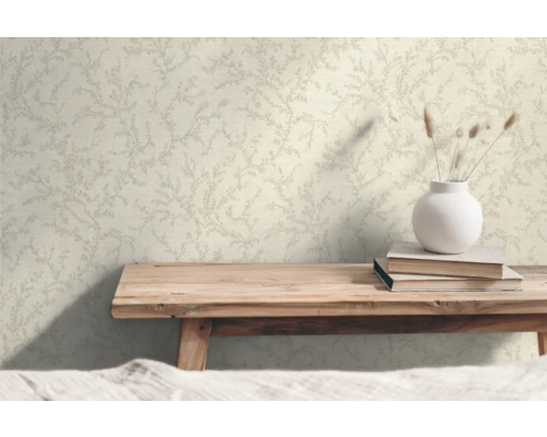 Close-up van een wandbehang met een subtiel bladerpatroon