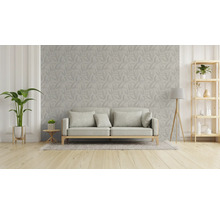 Woonkamer met bank, plant en rek