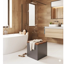 Badkamer met ligbad, wastafel en kruk