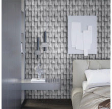 Slaapkamer met grijs 3D-behang, bed en nachtkastje