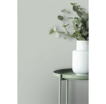 Behang met vaas en plant op een tafel