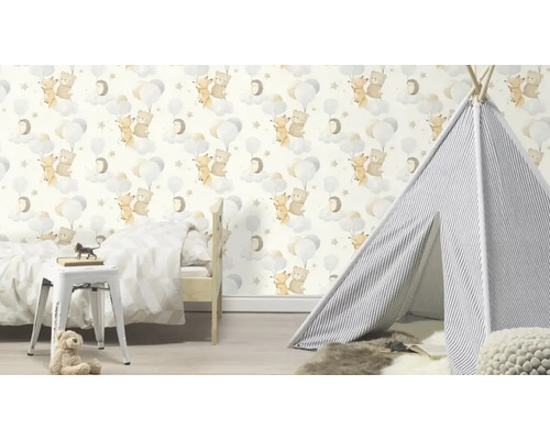 Kinderkamer met behang met dierenmotief, tipi-tent en bed