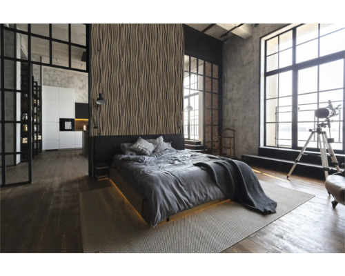 Slaapkamer in loftstijl met bed, decoratieve wandbekleding en grote ramen