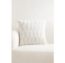 Decoratief kussen met patroon op een bank