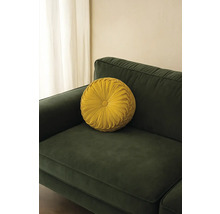 Rond decoratief kussen op een bank