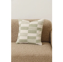 Decoratief kussen met grafisch patroon op een bank